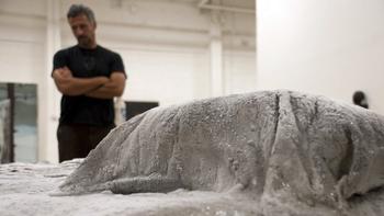 Enrique Martinez Celaya testing the bronze bed as it begins to freeze, Miami studio, 2011.